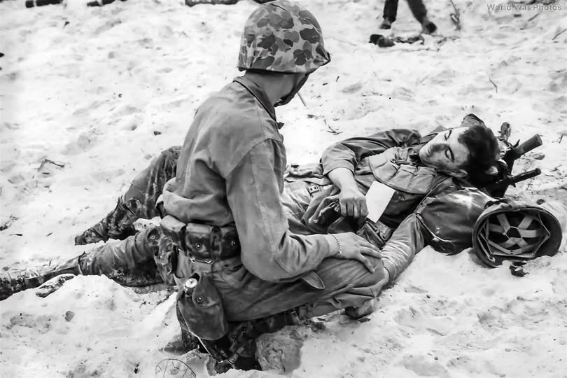 Navy Corpsman Treats a Wounded Marine on Peleliu